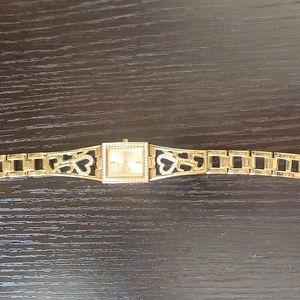 GUESS Women's U95081L1 Crystal Accented Heart Gold-Tone Bracelet Watch